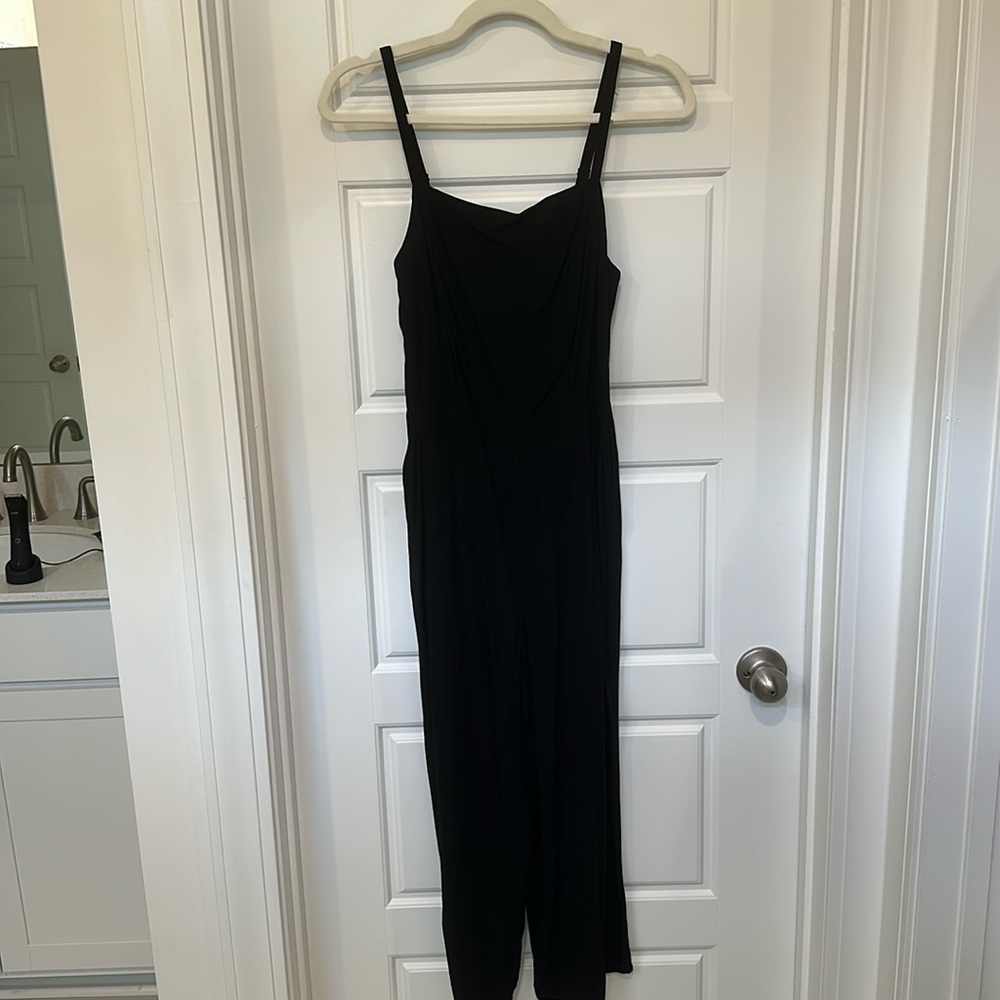 Women’s black jumpsuit.